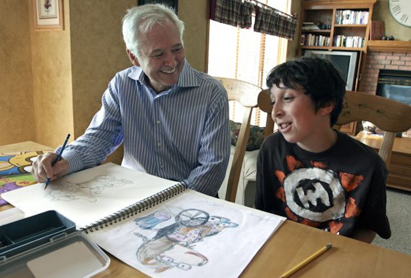 "Arthur" creator and author Marc Brown and budding artist Connor Gordon, 11, drew together at the Gordons' home in Savage as part of the prize in a contest Connor won for drawing Lydia, a fox in a wheelchair. Connor and his character will be featured in the June 30 live-action segment of the show.