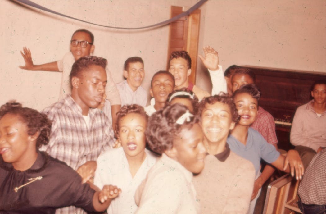 This image from a slide depicts several dancing teenagers circa 1955 at the Hallie Q. Brown community house.