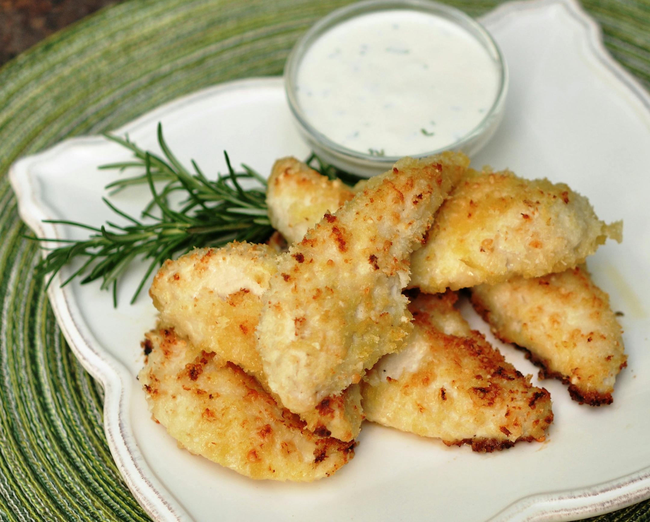 Meredith Deeds, Special to the Star Tribune Crispy Parmesan Chicken Tenders with Creamy Garlic-Rosemary Dipping Sauce. For June 5 Taste cover story.
