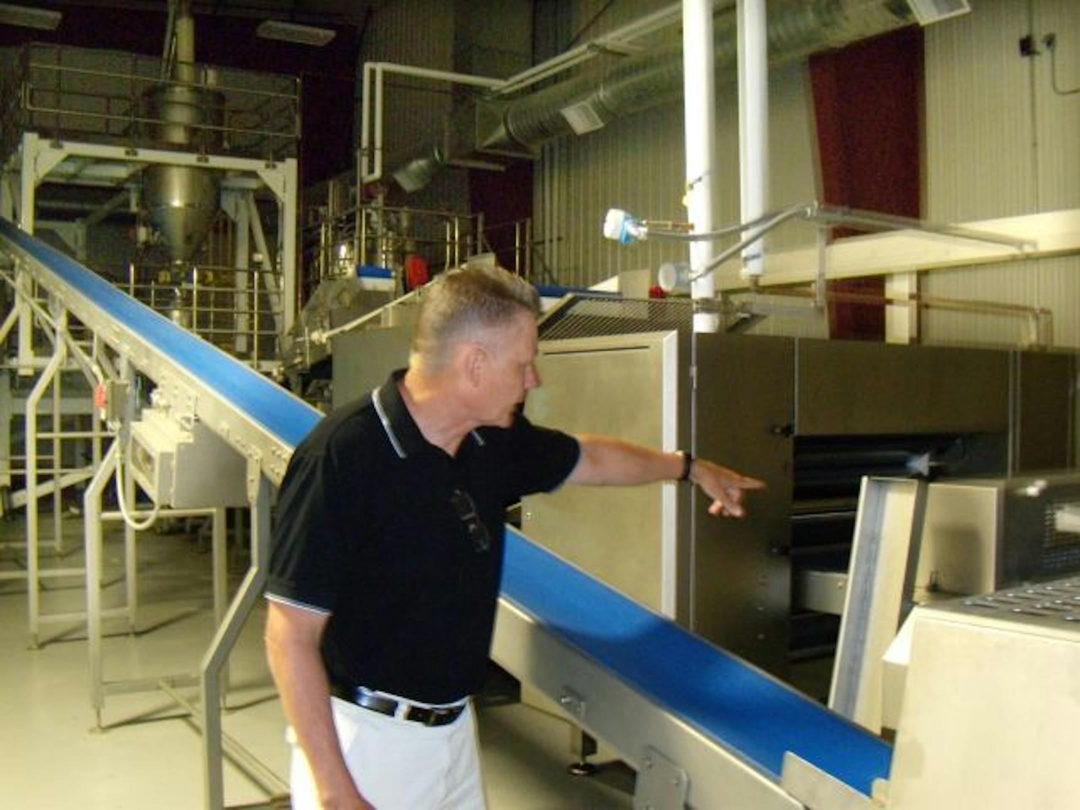 On the production line of a never-opened potato chip plant, Arlen Kangas pointed to where potato flour and flakes would be put into an oven to be baked into a uniform stackable shape.