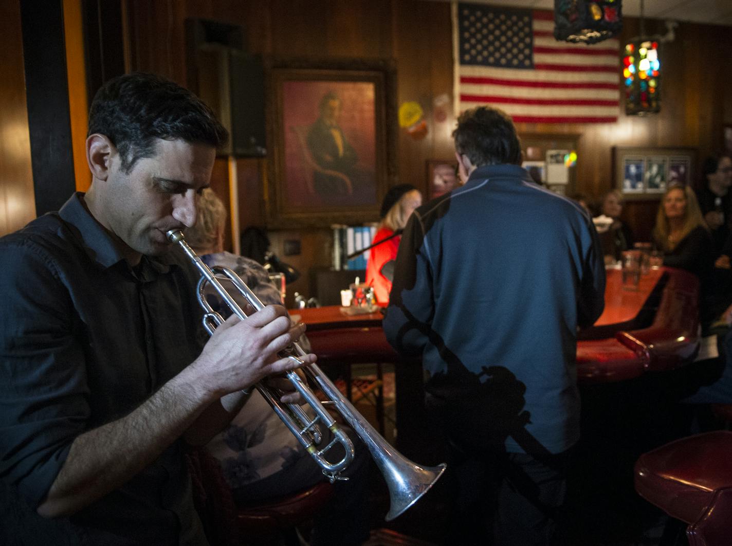 Erez Lirov played "New York State of Mind" on trumpet, one of many regulars to play or sing along at the piano bar.