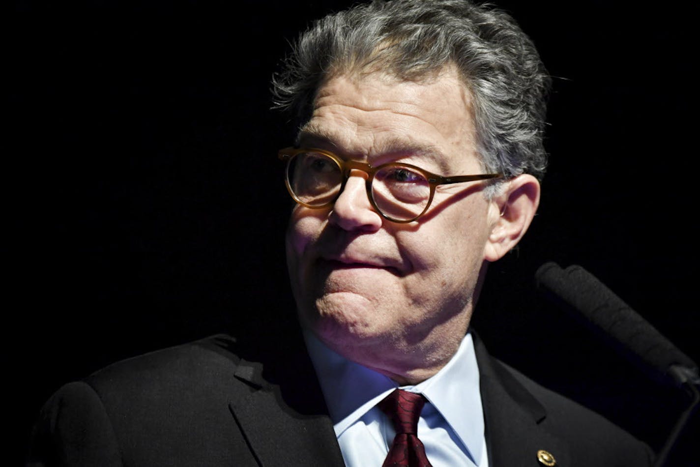 Outgoing U.S. Sen. Al Franken looks over at his wife Franni and thanked her for always being at his side at an event, Thursday, Dec. 28, 2017, in Minneapolis. The Minnesota Democrat thanked supporters and friends in Minneapolis Thursday night as his eight years in the Senate are set to come to an end. Franken announced his plans to resign earlier this month amid a string of sexual misconduct allegations. He'll officially step down on Tuesday, Jan. 2. (Glen Stubbe/Star Tribune via AP)