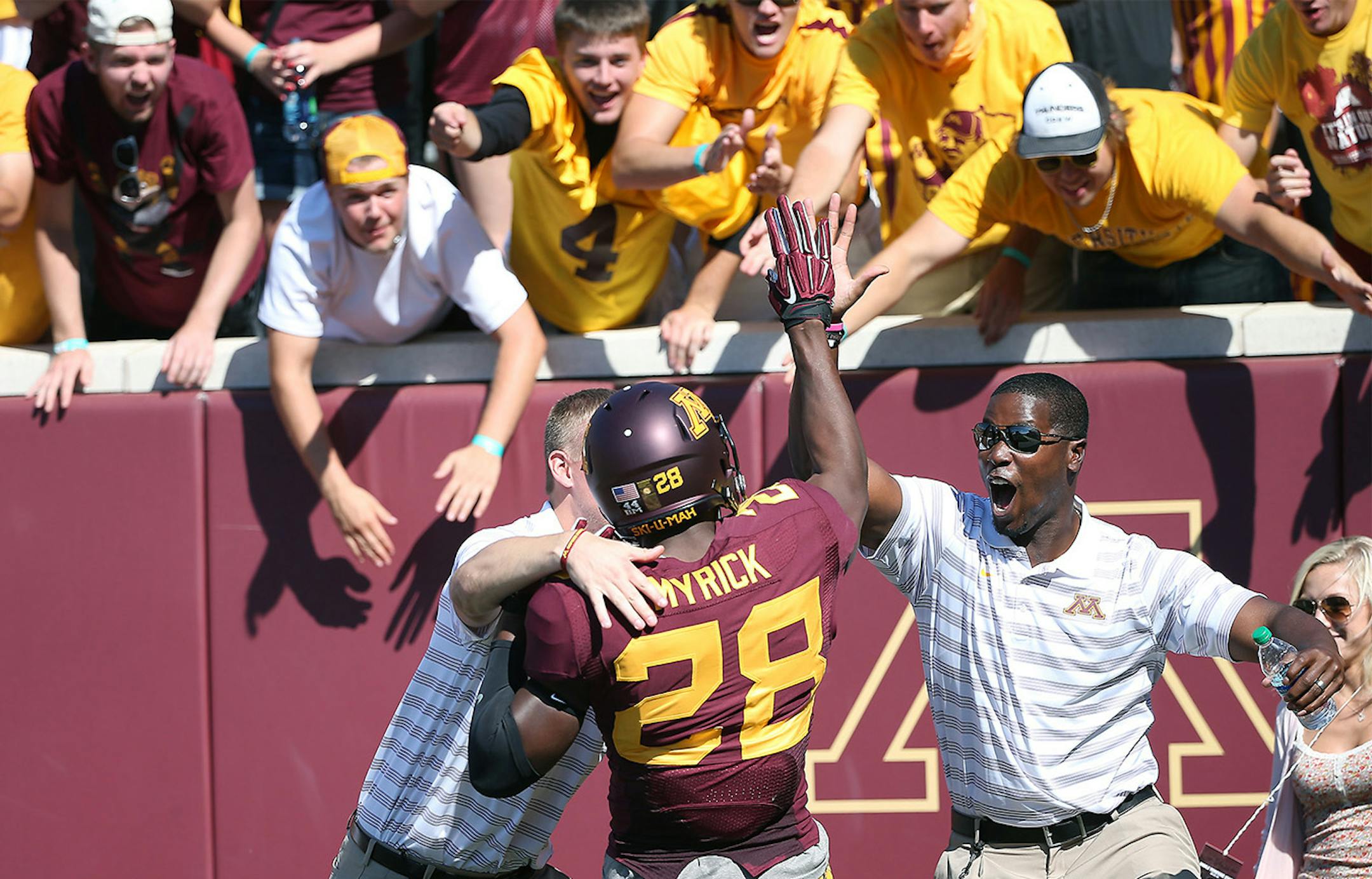 Minnesota sophomore defensive back Jalen Myrick was greeted by the crowd after scoring a touchdown in the second quarter as the Minnesota Gophers took on Middle Tennessee at TCF Bank Stadium, Saturday, September 6, 2014 in Minneapolis, MN. ] (ELIZABETH FLORES/STAR TRIBUNE) ELIZABETH FLORES • eflores@startribune.com