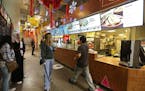 People made their way in and around the different food vendors during the lunch hour at the Midtown Global Market, Thursday, December 22, 2016 in Minn