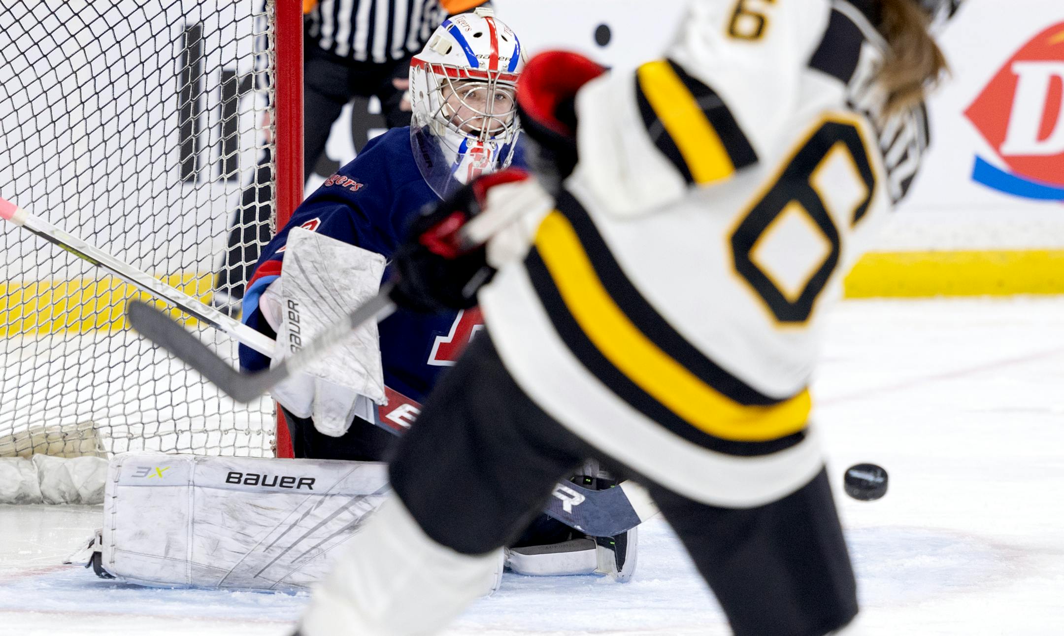 2Rylee Bartz (6) of Warroad gets the puck past Albert Lea goalie Jayda Moyer (2) for a goal in the first period.