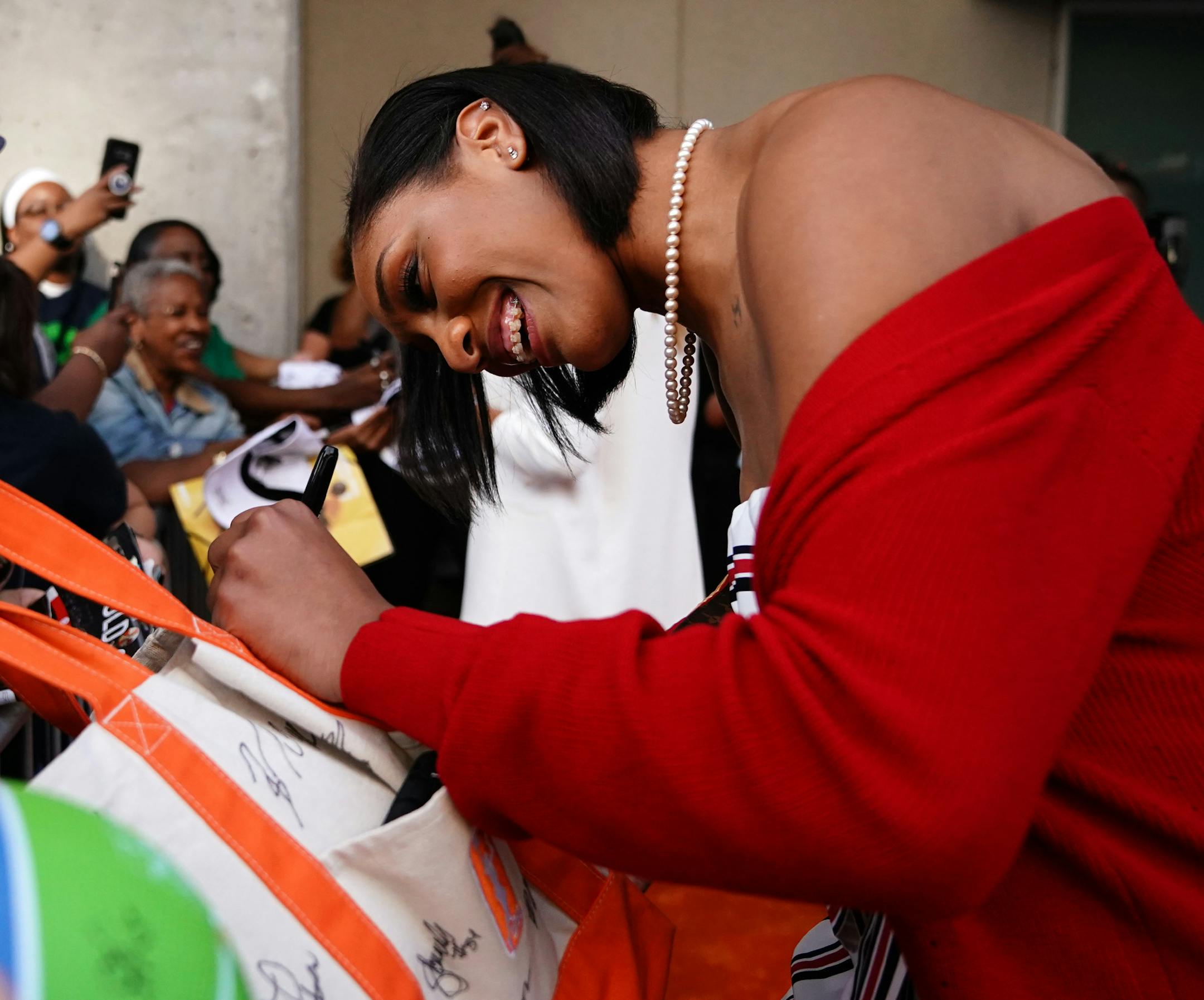 Las Vegas Aces forward A'ja Wilson signed autographs for fans as she arrived on the orange carpet. ] ANTHONY SOUFFLE ï anthony.souffle@startribune.com Players arrived on the orange carpet for a private formal reception ahead of the WNBA All Star Game Friday, July 27, 2018 at the Target Center in Minneapolis