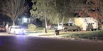 A sheriff's deputy shot and killed a man who was attacking her outside a home in east-central Minnesota, authorities said Thursday.