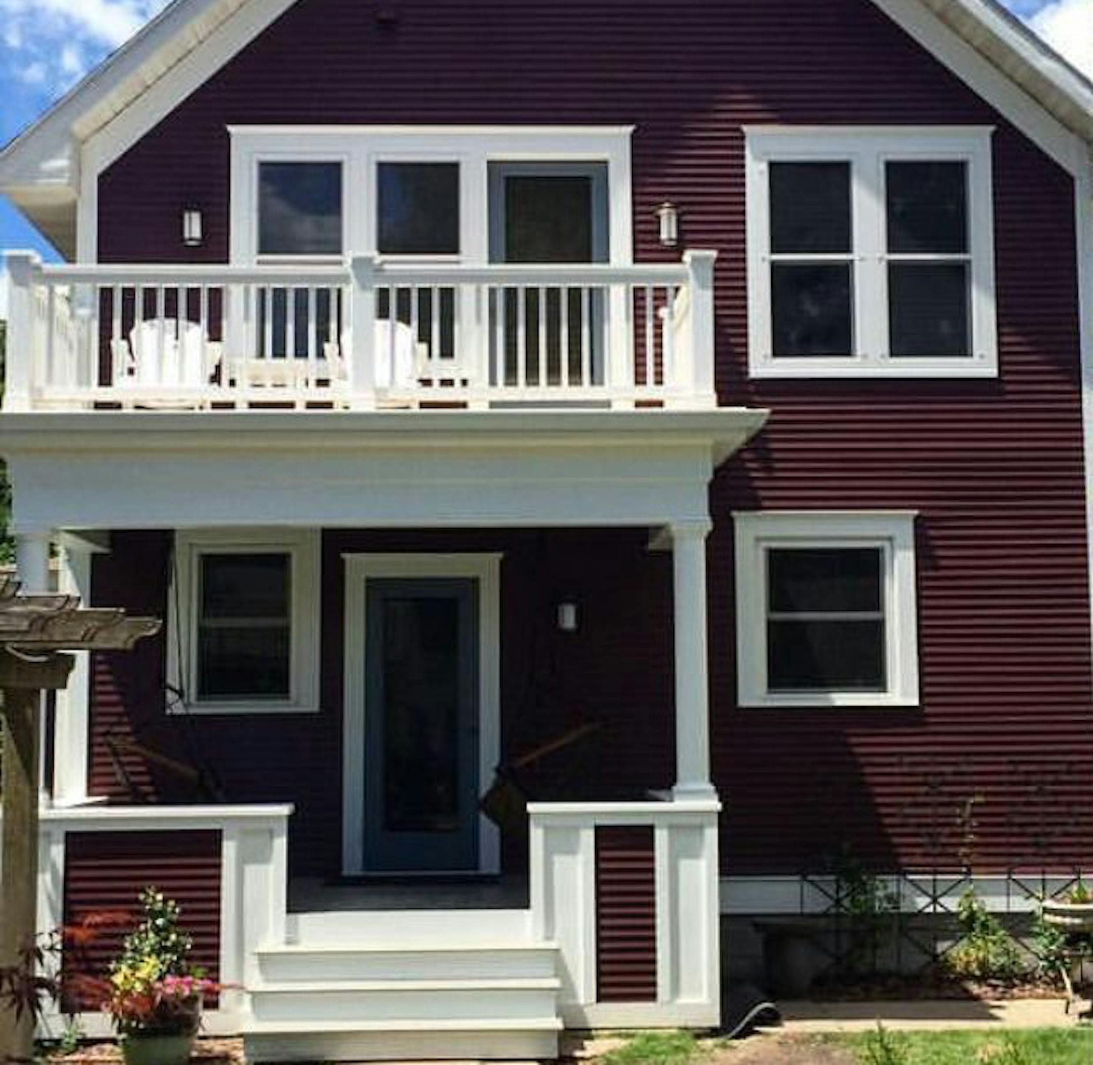 Porch and upper balcony addition by David Heide Design Studio.