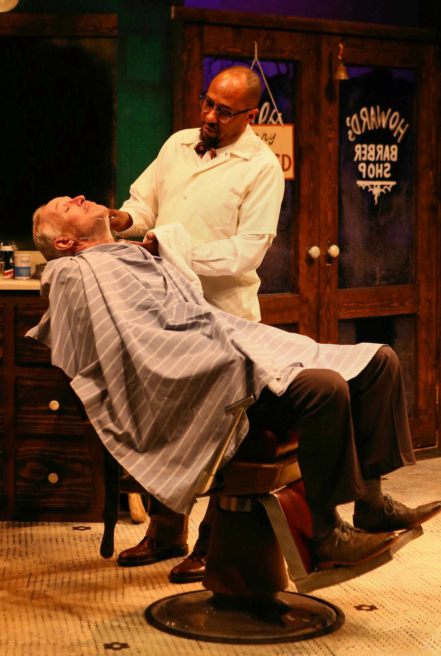 Peter Thomson, left, plays a St. Paul city planner and Kevin D. West a barber whose business is destroyed to make way for Interstate 94.