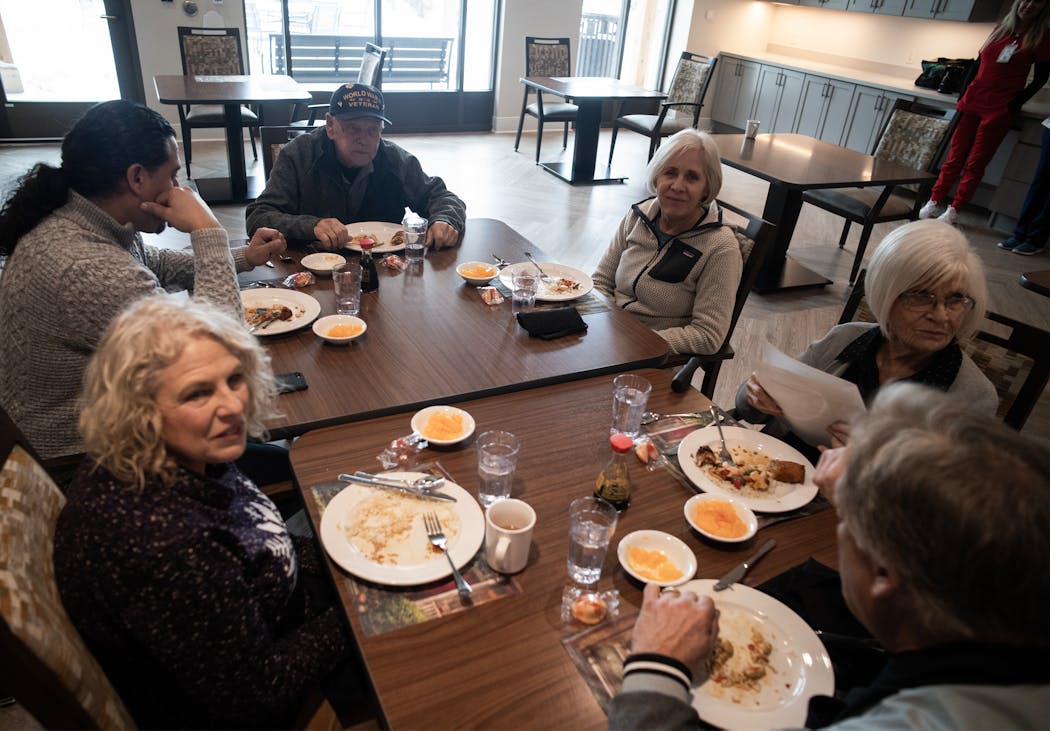 WWII vet Bill Homan enjoyed lunch with family at his new home in Montevideo on Monday.