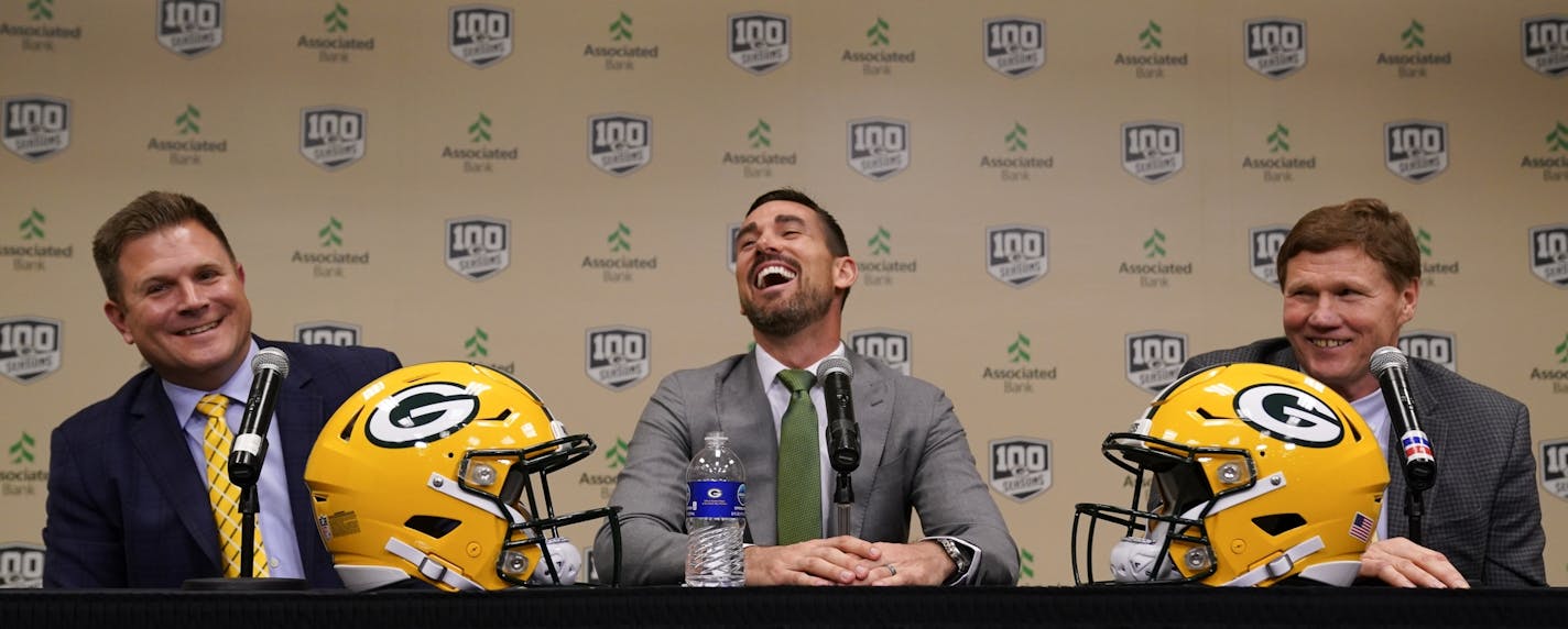 Green Bay Packers head coach Matt LaFleur smiles as he is introduced by General Manager Brian Gutekunst and President and CEO Mark Murphy at a news conference Wednesday, Jan. 9, 2019, in Green Bay, Wis. (AP Photo/Morry Gash)