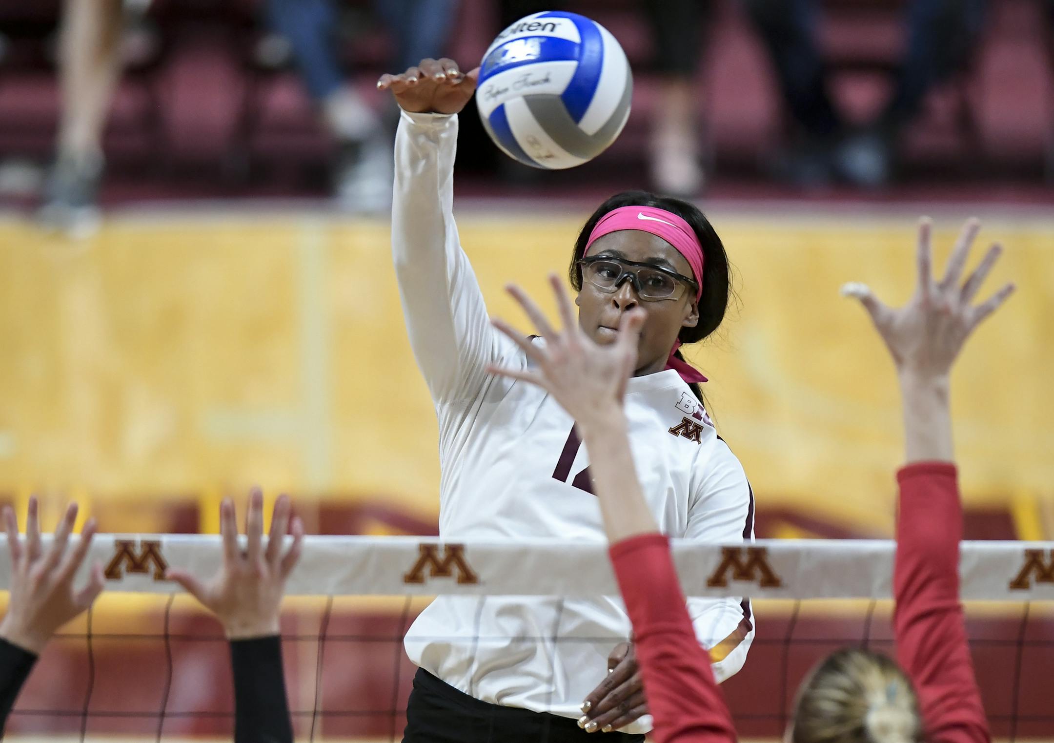 Gophers middle blocker Taylor Morgan (12) spiked the ball against Indiana for a point in the first set. ] Aaron Lavinsky • aaron.lavinsky@startribune.com The Gophers volleyball team played the Indiana Hoosiers on Friday, Sept. 27, 2019 at the University of Minnesota's Maturi Pavilion in Minneapolis, Minn.