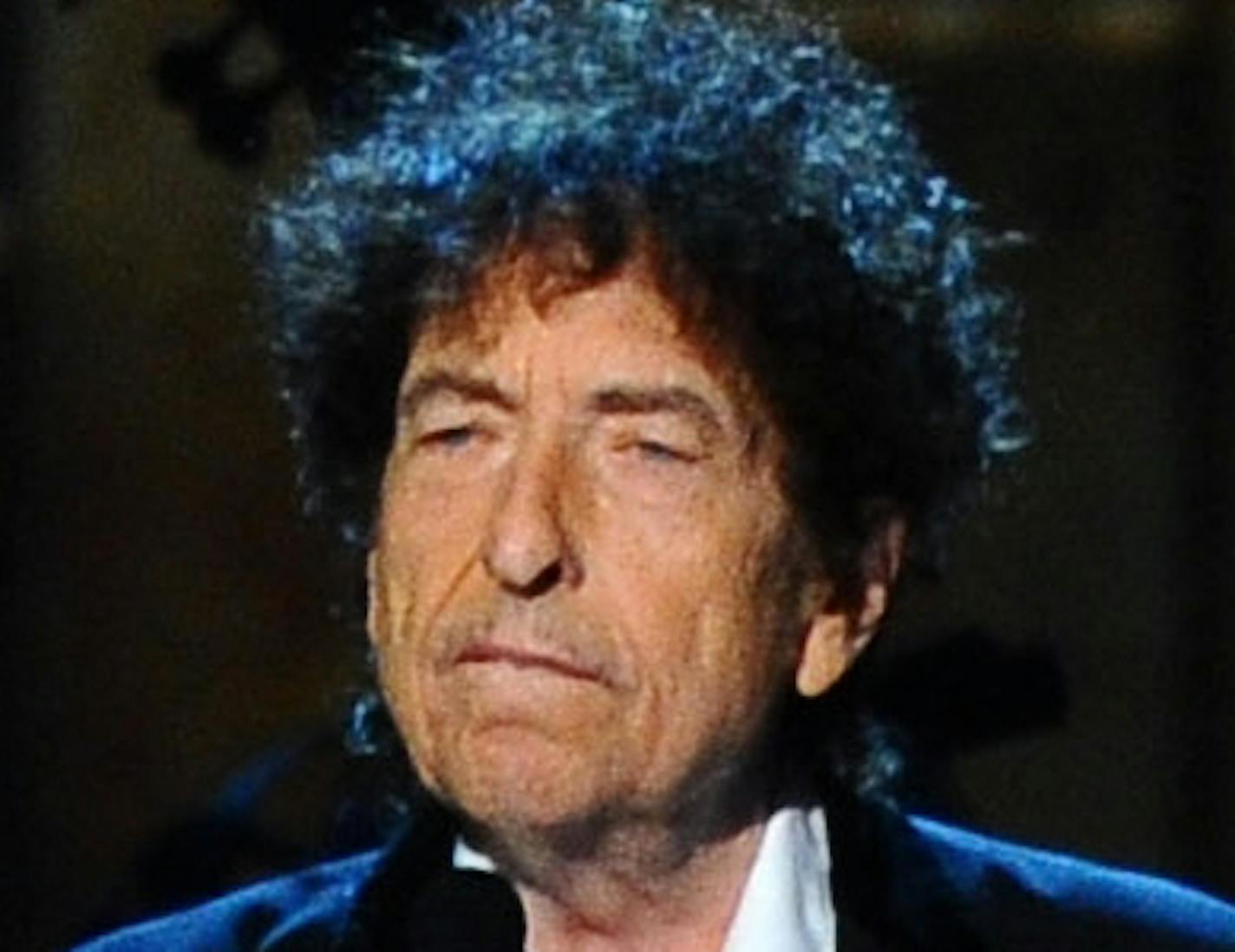 In this Feb. 6, 2015 file photo, Bob Dylan accepts the 2015 MusiCares Person of the Year award at the 2015 MusiCares Person of the Year show in Los Angeles.