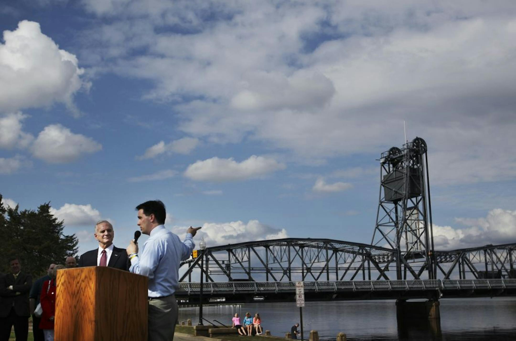Dayton, left, and Walker stood near the Stillwater Lift Bridge, above the St. Croix River Friday, March 23, 2012, at Lowell Park in Stillwater, MN.