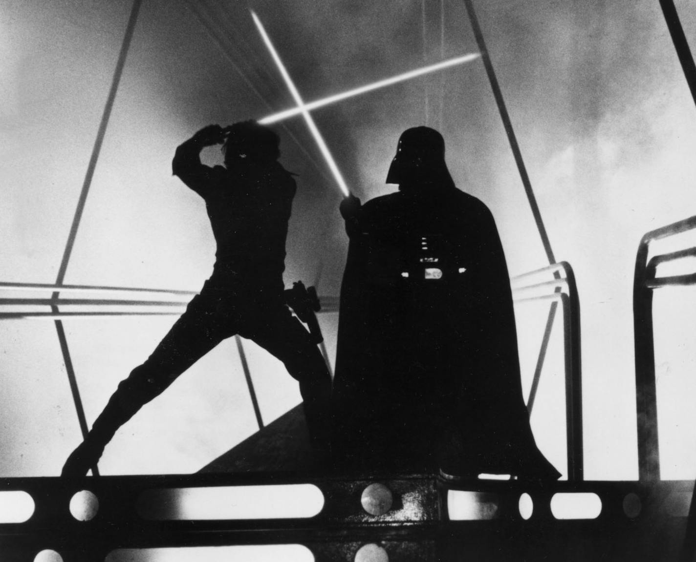 Luke Skywalker (played by Mark Hamill, at left) and Darth Vader (played by David Prowse, right) battle with lightsabers in the 1980 movie "The Empire Strikes Back," one of the Star Wars series of movies. Handout photo courtesy of Lucasfilm Ltd. and 20th Century Fox.