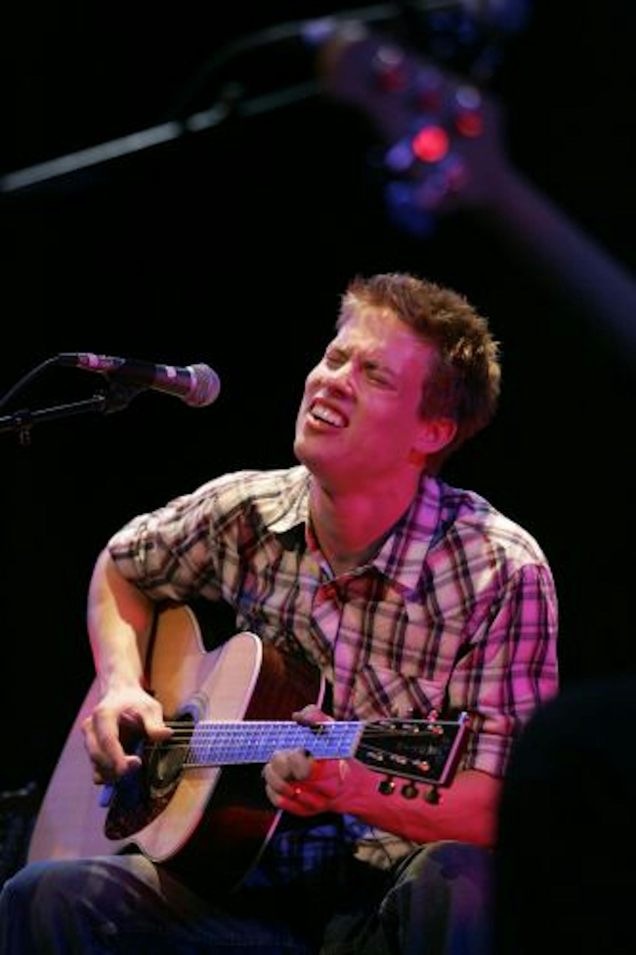Jonny Lang, unplugged, during his set at the Guthrie Monday night. GENERAL INFORMATION: Staff photo by Jeff Wheeler MINNEAPOLIS - 3/28/05 - Jonny Lang, the blues wunderkind with local ties, returned to the Twin Cities for a sold out acoustic show at the Guthrie Theater Monday night.