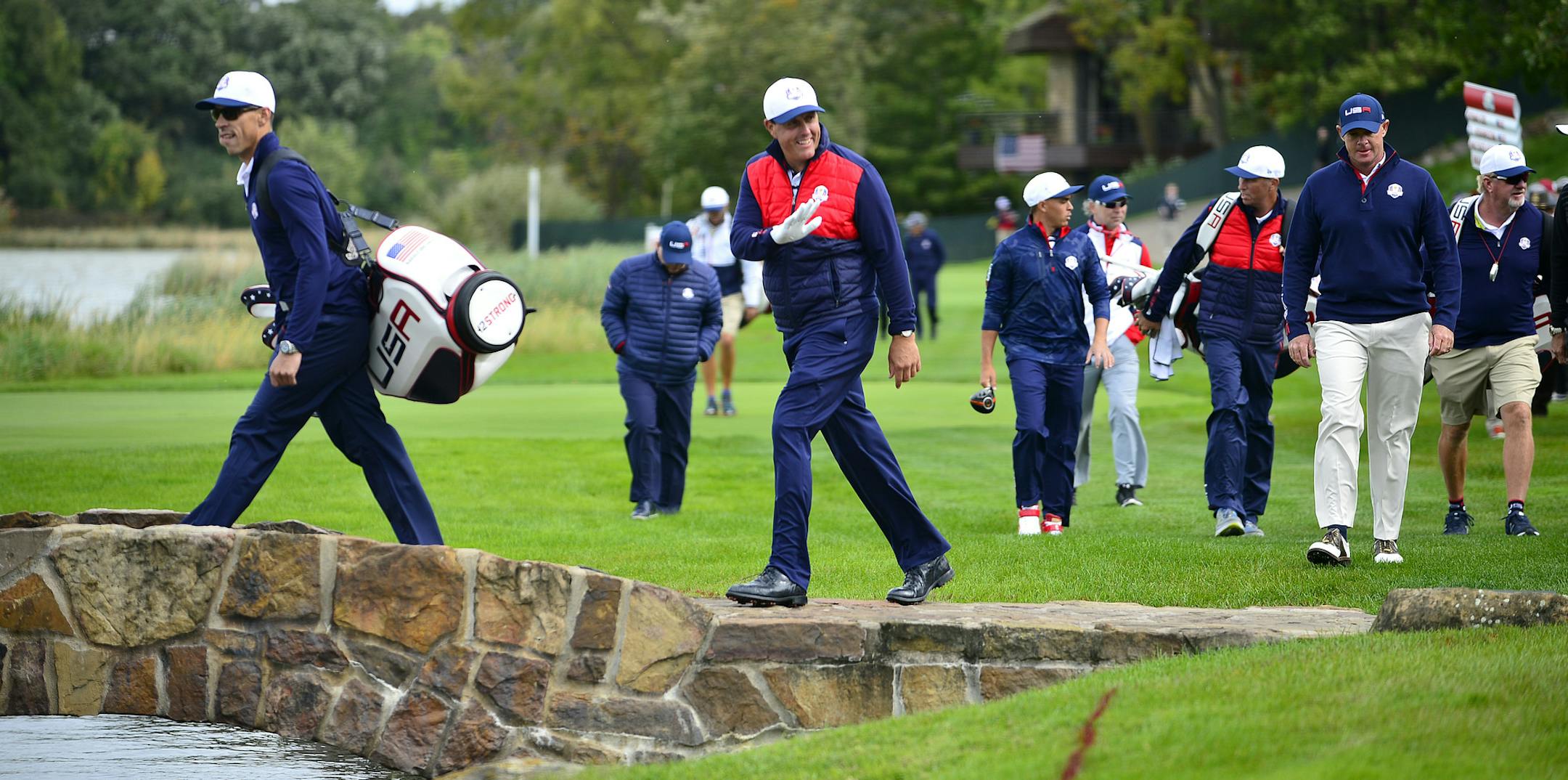 Phil Mickelson waved to fans as he crossed over the Payne Stewart Bridge on the fairway of the 7th hole Tuesday at Hazeltine. ] (AARON LAVINSKY/STAR TRIBUNE) aaron.lavinsky@startribune.com Team USA and Team Europe practiced for the Ryder Cup at Hazeltine National Golf Club on Tuesday, Sept. 27, 2016 in Chaska, Minn.