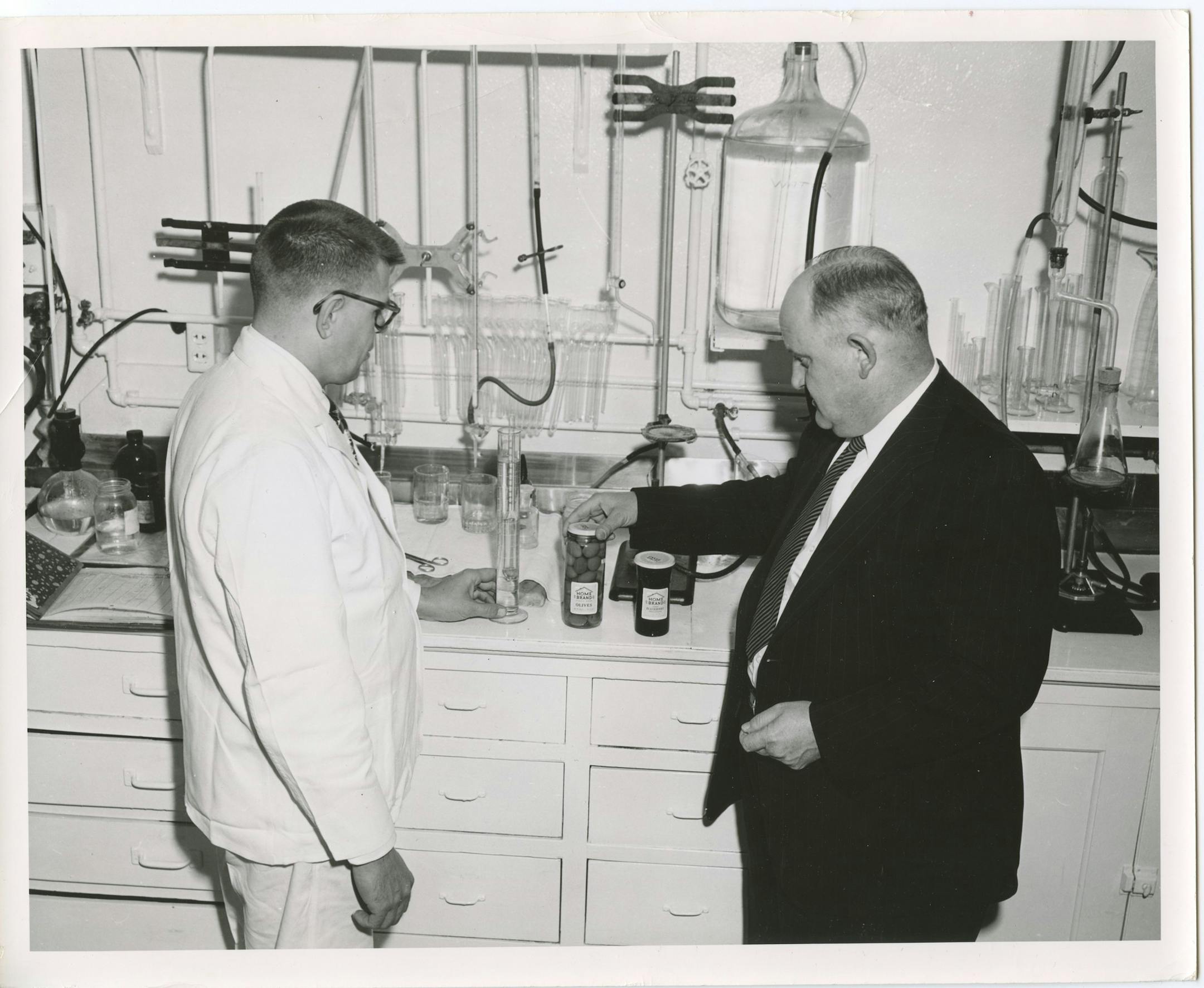 Lab at Griggs, Cooper & Co.. The company opened a model food plant at University and Fairview Avenues as part of a cluster built around agriculture. The company was not only a distributor of grocery products but also a manufacturer of its own brands of crackers, cookies, candy, coffee, spices and jams and jellies under the " Home Brand" and "Sanitary Products" labels. It was acquired in 1956 by Wirtz Beverage.