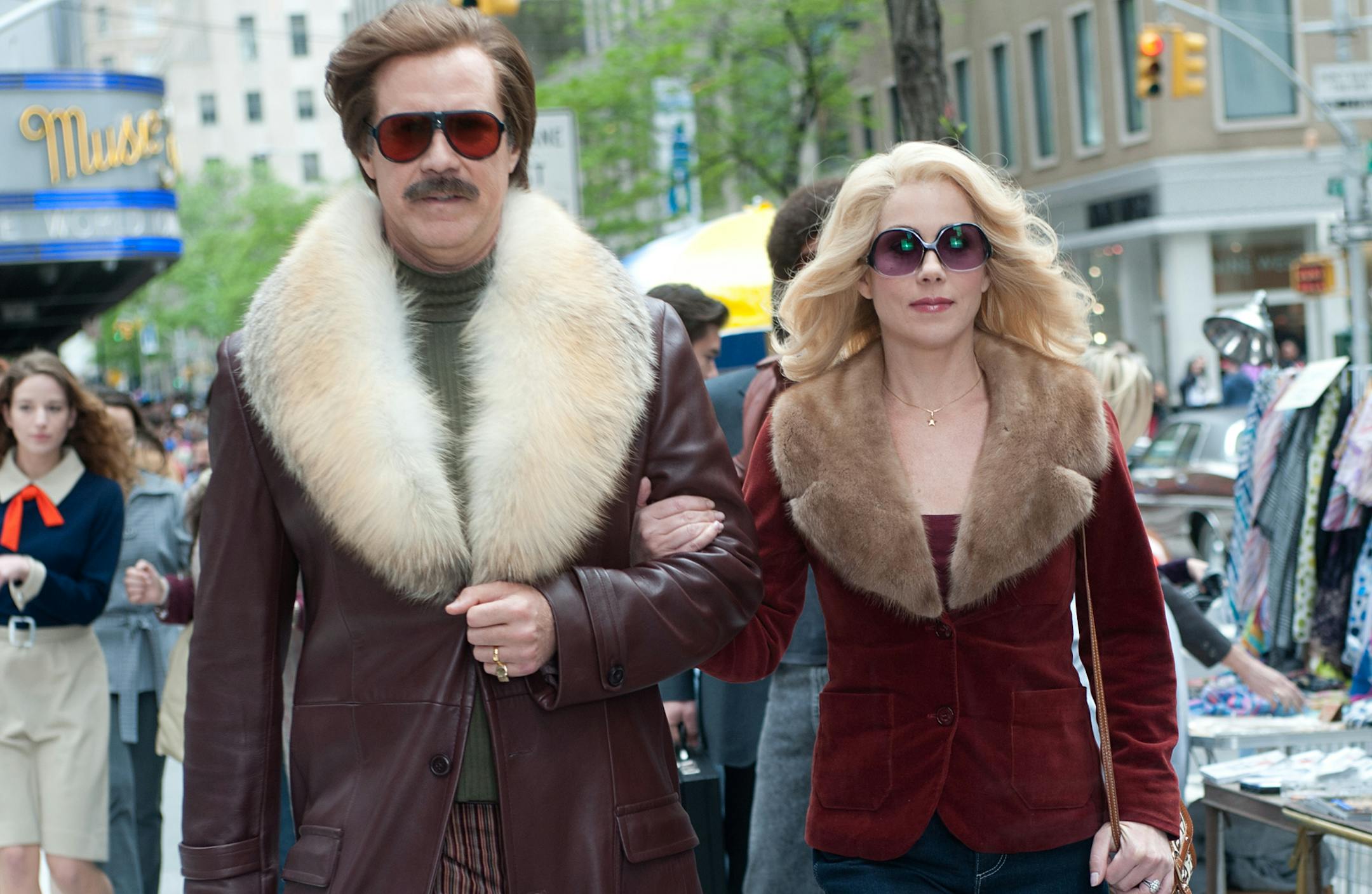 (Left to right) Will Ferrell is Ron Burgundy and Christina Applegate is Veronica Corningstone in ANCHORMAN 2: THE LEGEND CONTINUES to be released by Paramount Pictures. A2-19322Rv2