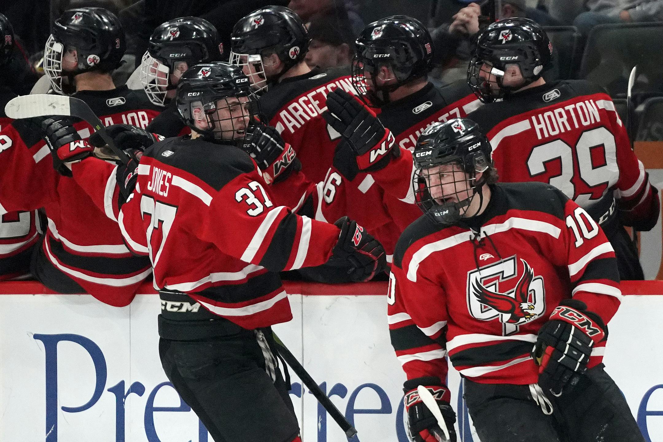 Eden Prairie forward Garrett Smith (10) celebrated with his teammates on the bench after scoring in the second period. ] ANTHONY SOUFFLE • anthony.souffle@startribune.com Blaine High School played Eden Prairie High School in a Class 2A boys hockey semifinal game Friday, March 8, 2019 at the Xcel Energy Center in St. Paul, Minn.