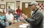 Randy Ruppert addresses residents during a meeting at the Nickerson, Neb., fire hall, Tuesday, April 19, 2016. When regional officials announced plans