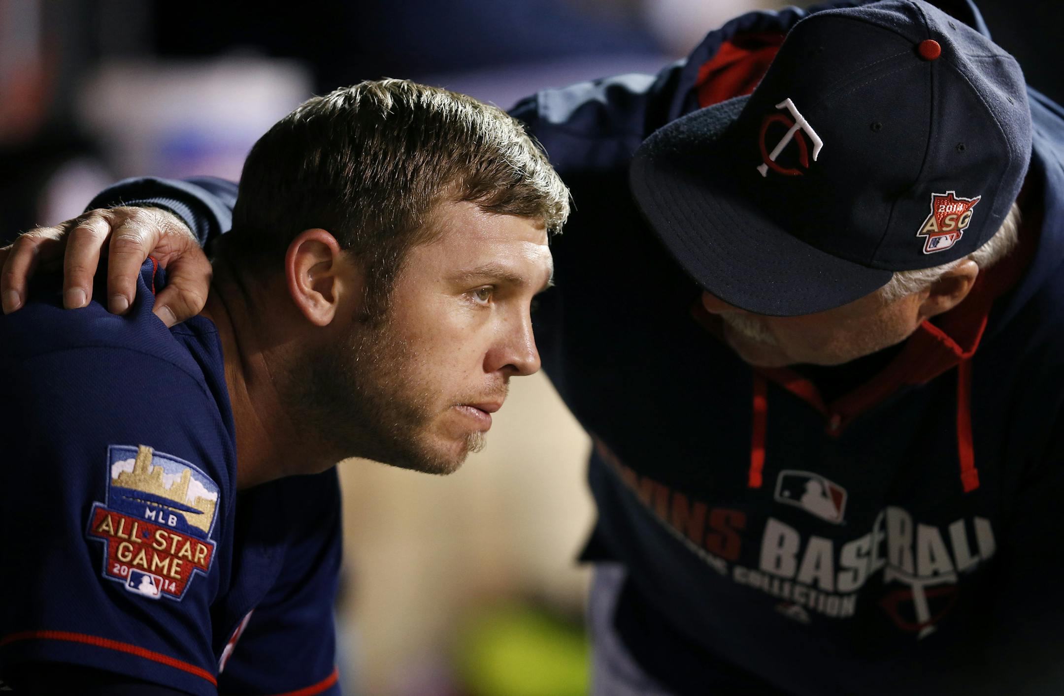 Twins pitching coach Rick Anderson talked to pitcher Casey Fien (50) on the bench after he was pulled out of the game. Fien gave up back-to-back home runs in the ninth inning. Detroit beat Minnesota by a final score 8-6. ] CARLOS GONZALEZ cgonzalez@startribune.com - September 15 , 2014 , Minneapolis, Minn., Target Field, MLB, Minnesota Twins vs. Detroit Tigers