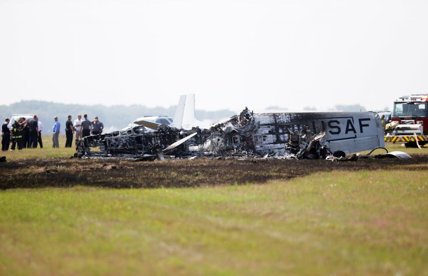 A vintage military airplane crashed and exploded into flames Thursday, Aug. 23, 2018, at the Anoka County Airport in Blaine, MN.