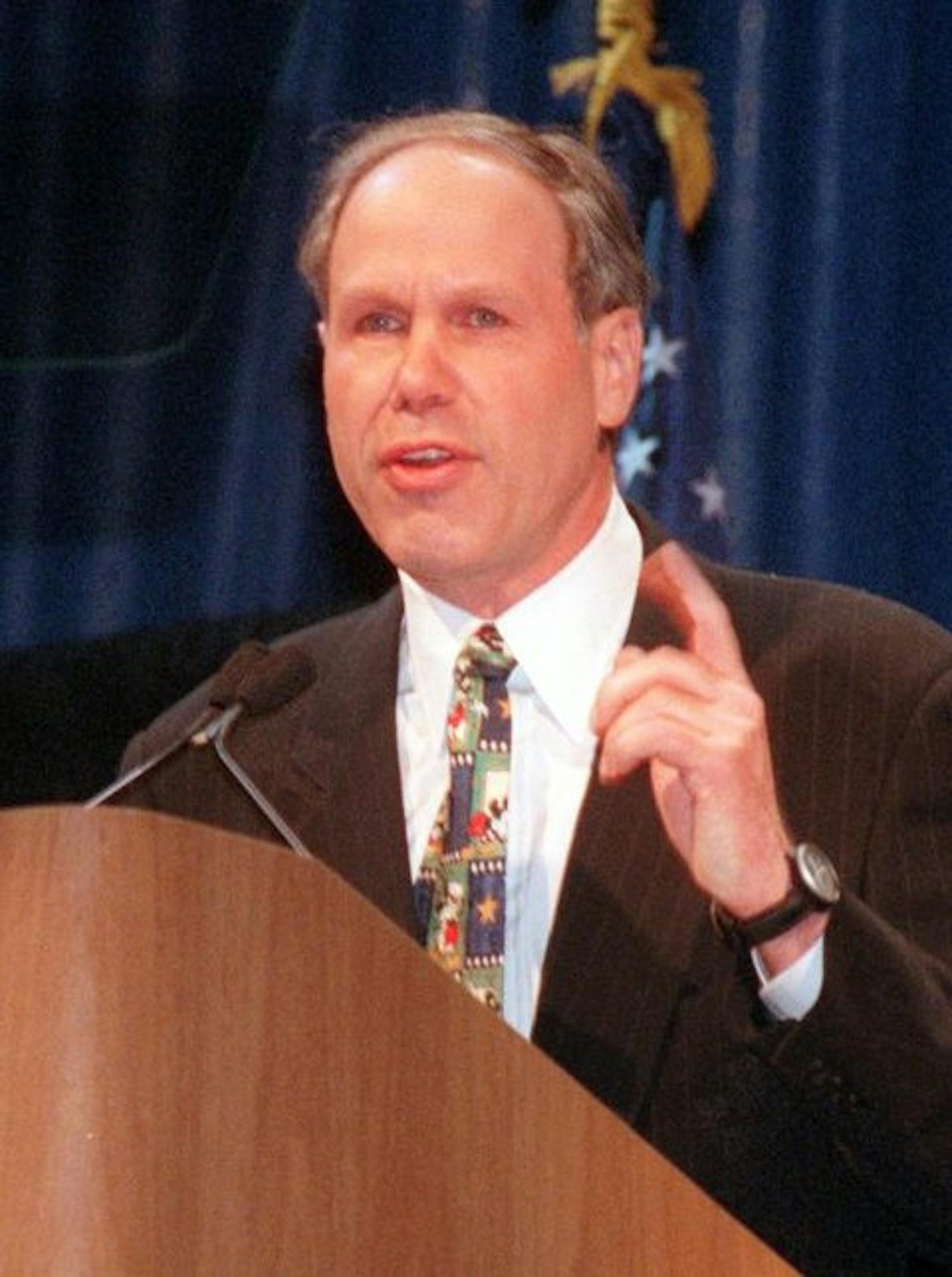 Michael Eisner, chief executive officer and chairman of the board of Walt Disney Co., speaks at The 1997 annual meeting of stockholders Tuesday, Feb, 25, 1997, at the Arrowhead Arena in Anaheim, Calif. Picketers outside the meeting accused the entertainment empire of turning top executives into multimillionaires at the expense of overseas workers and the people living near its theme parks. (AP Photo/Nick Ut)