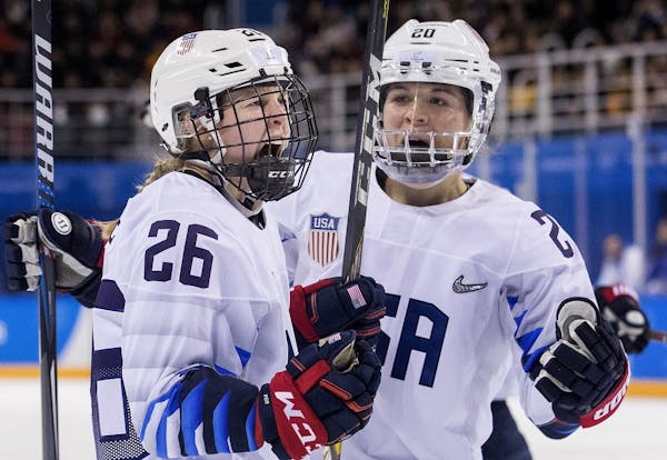 Kendall Coyne (26) and Hannah Brandt (20) celebrated after Coyne scored a goal in the second period of the U.S.-Finland game.