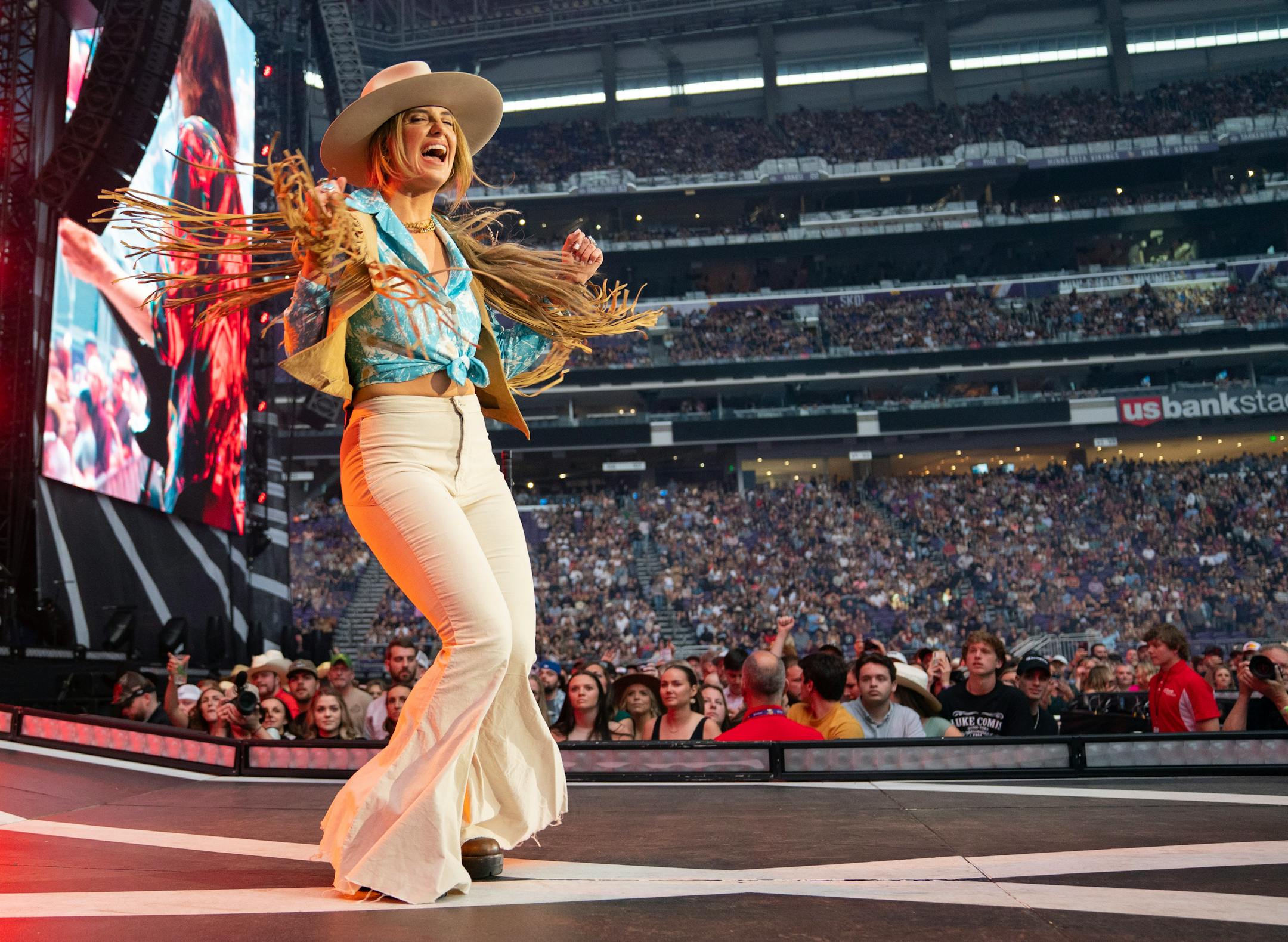 Lainey Wilson opened for Luke Combs at U.S. Bank Stadium.