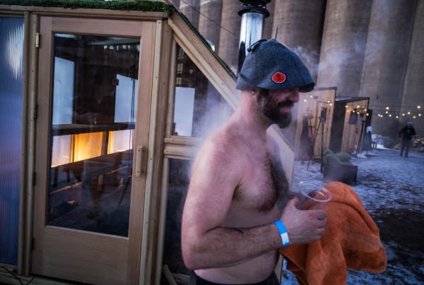Sauna enthusiast Israel Lowell with his sauna hat emerges from the Superior Sauna &amp; Steam, one of the hotter saunas in Minneapolis, Minn., on Thur