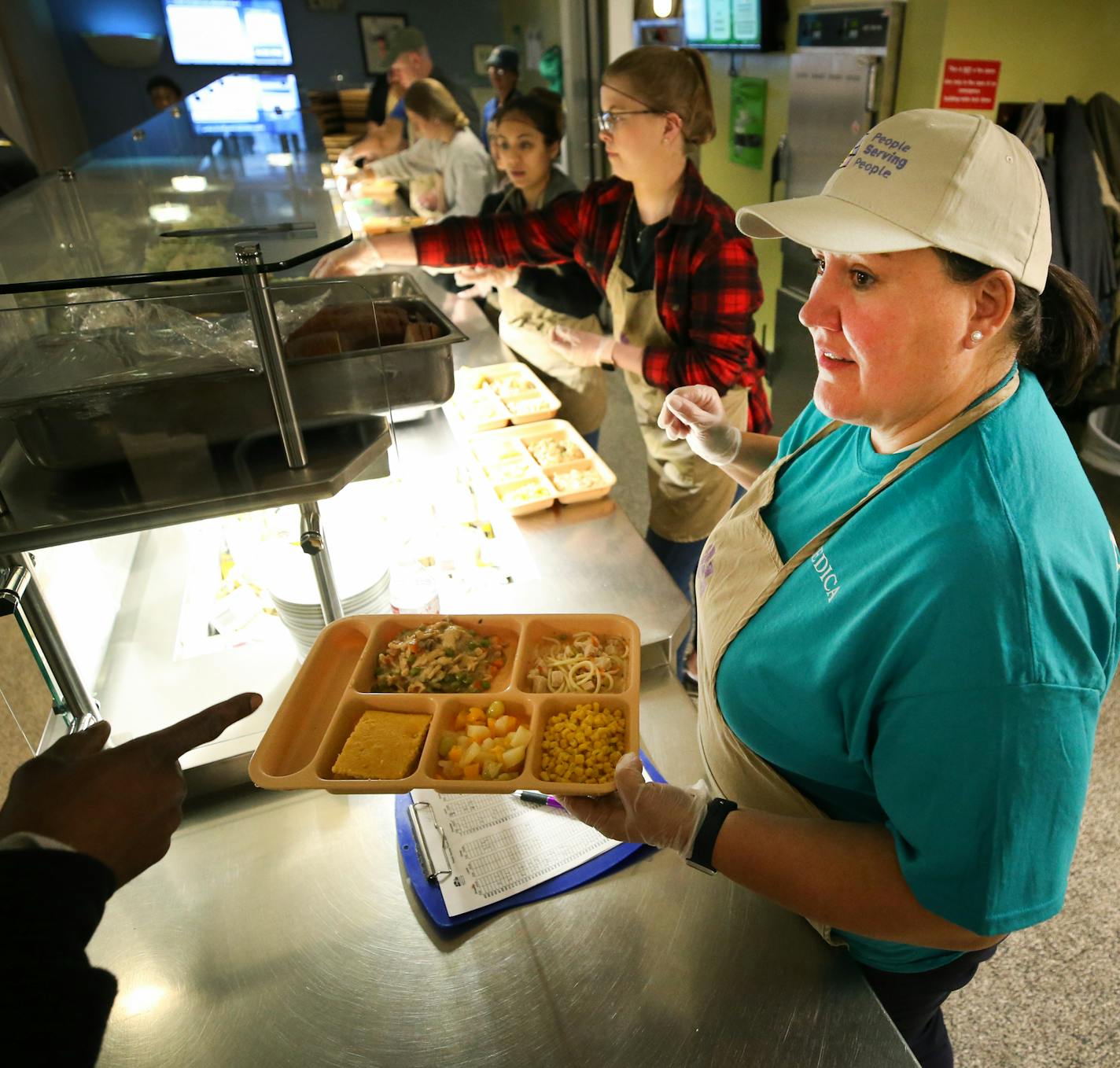 Natasha Farhat celebrated her fifth year anniversary as a volunteer at People Serving People on Thursday, April 4, 2019. ] Shari L. Gross &#x2022; shari.gross@startribune.com Medica employee Natasha Farhat will be serving dinner tonight at People Serving People thanks to the fact she can use VTO (volunteer paid time off). Medica gives its employees 16 hours of PTO a year specifically to use toward volunteering. Workplaces across Minnesota do volunteer events, but some corporations are taking it