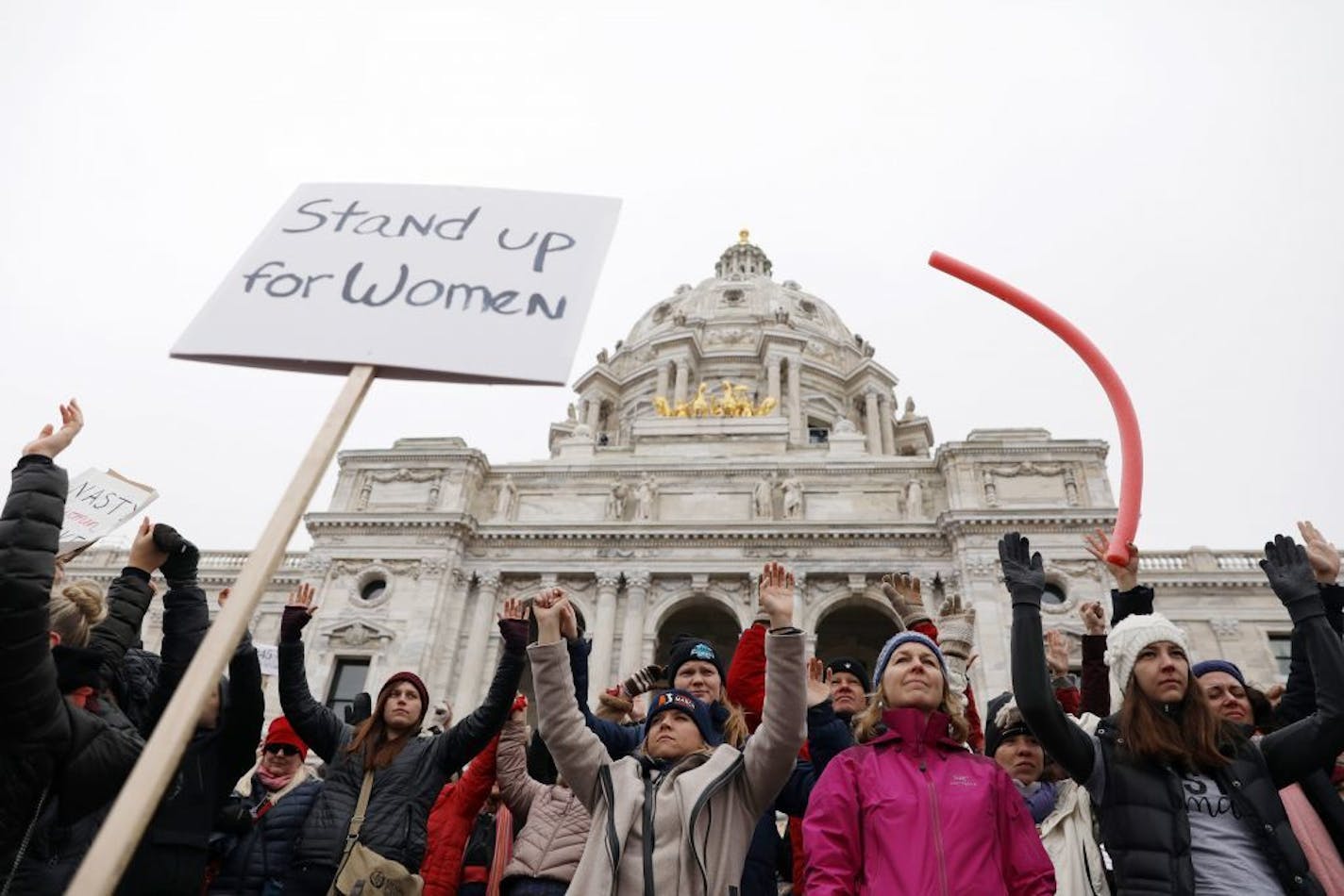 Women's activists and supporters gathered at the State Capitol for the Women's March Minnesota on Saturday in St. Paul, part of a worldwide day of protests.