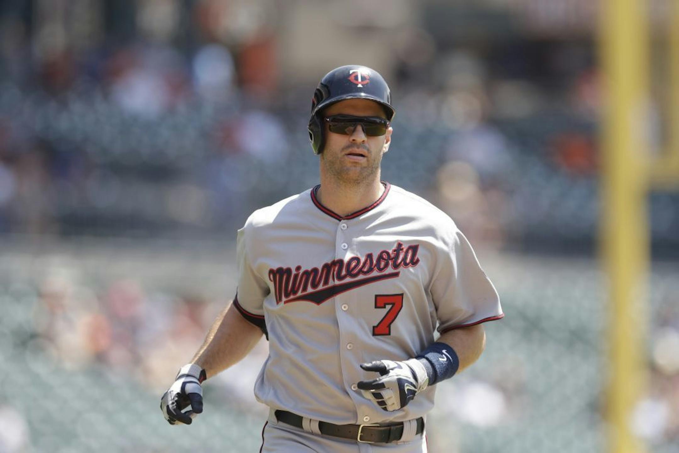 Minnesota Twins' Joe Mauer heads home after his solo home run during the first inning of a baseball game against the Detroit Tigers, Wednesday, July 20, 2016 in Detroit.