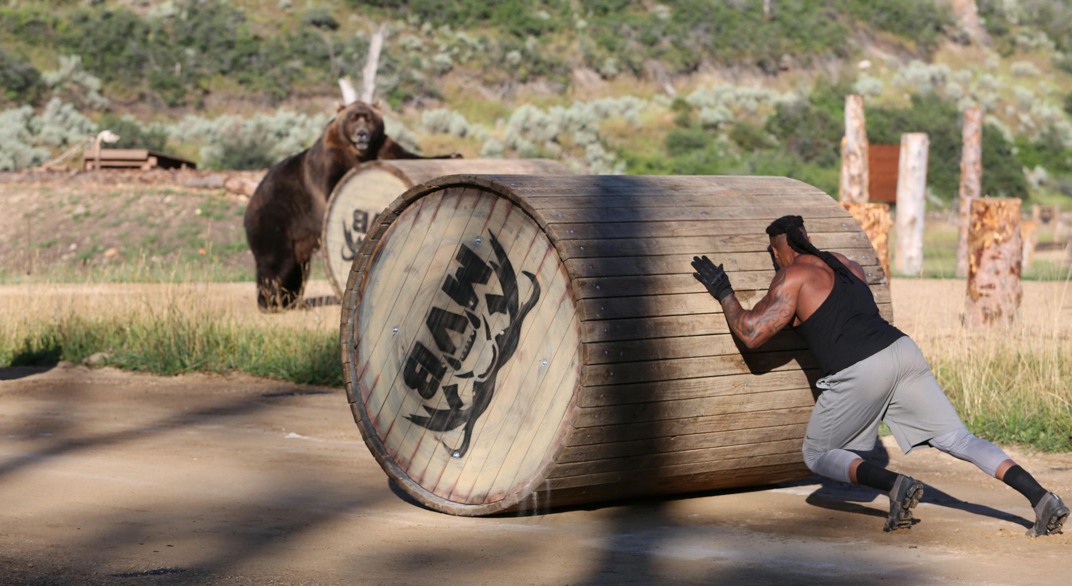 Kannon during log challenge on "Man vs. Bear." ORG XMIT: Producer Deliverable