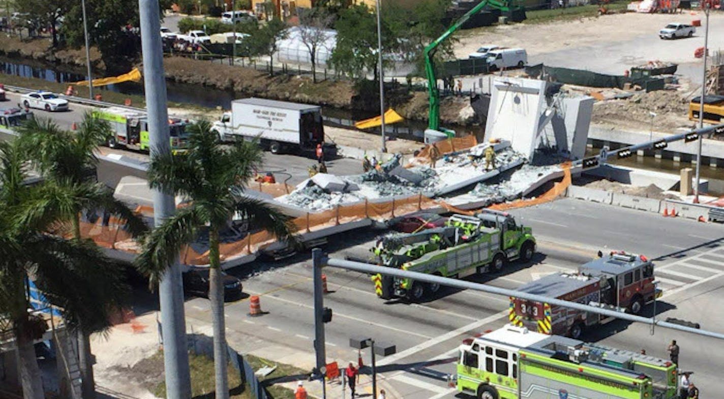 A pedestrian bridge at Florida International University collapsed Thursday, March 15, 2018 at SW 109th Avenue and 8th Street in Miami, trapping unknown numbers of people beneath.