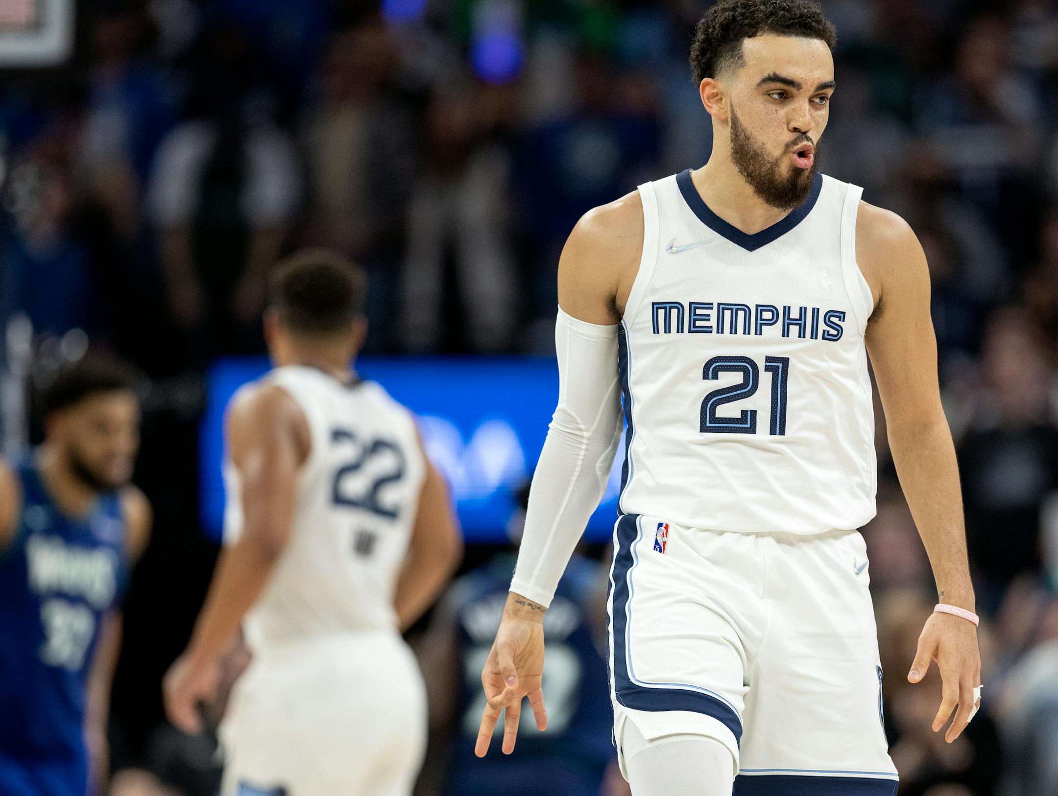 Tyus Jones (21) of the Memphis Grizzlies reacts after making a three pointer late in the fourth quarter.