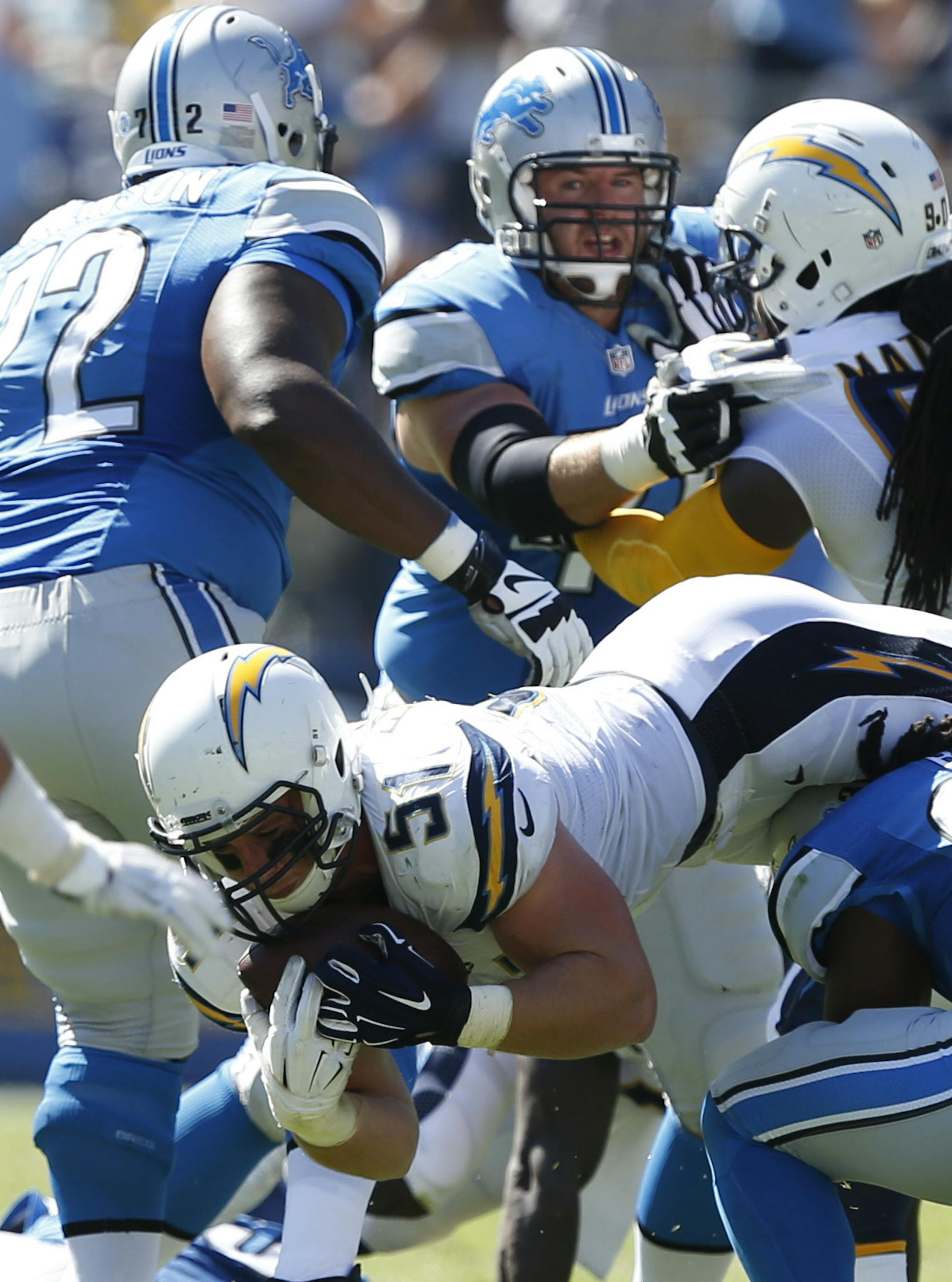 San Diego Chargers linebacker Kyle Emanuel grabs an interception against the Detroit Lions during the second half of an NFL football game Sunday, Sept. 13, 2015, in San Diego. (AP Photo/Alex Gallardo) ORG XMIT: CAGB