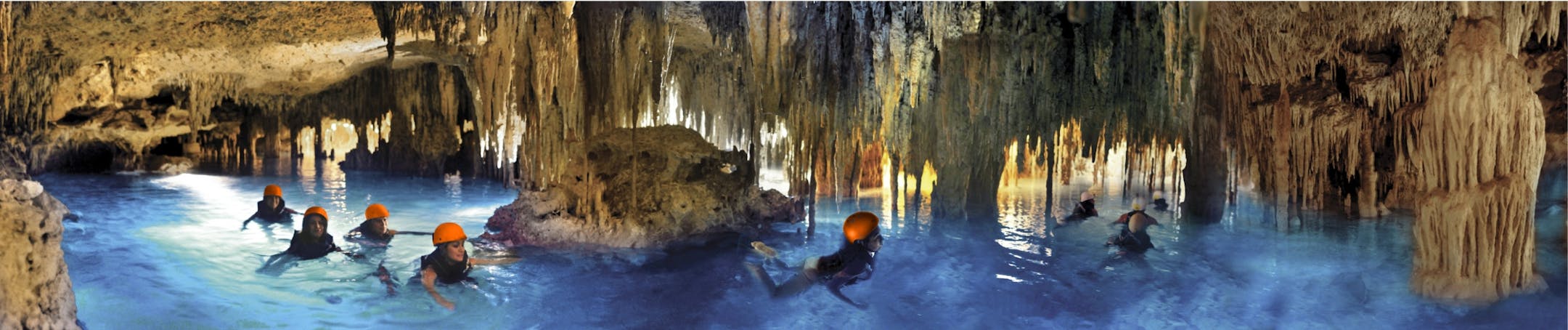 Swimming through an underground river is like swimming on another planet.