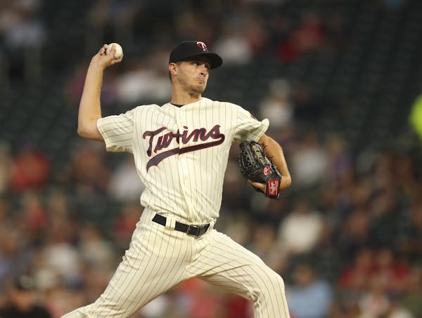 Minnesota Twins starting pitcher Jake Odorizzi throwing against New York in the second inning.