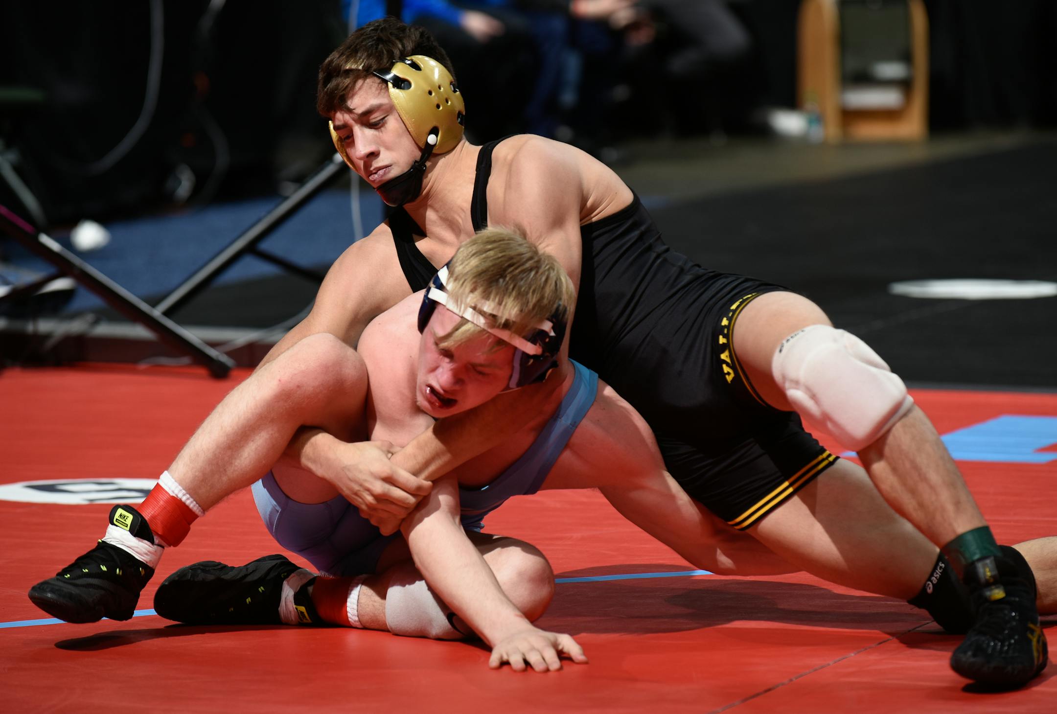 Apple Valley's Sebas Swiggum , right, wrestled against Albert Lea's Gavin Ignaszewski during a Class 3A 132 lbs quarterfinals match Friday. Swiggum won the match by decision 7-2. ] AARON LAVINSKY • aaron.lavinsky@startribune.com The Class 3A, 2A and 1A state wrestling tournament individual quarterfinals were held Friday, March 2, 2018 at the Xcel Energy Center in St. Paul, Minn.