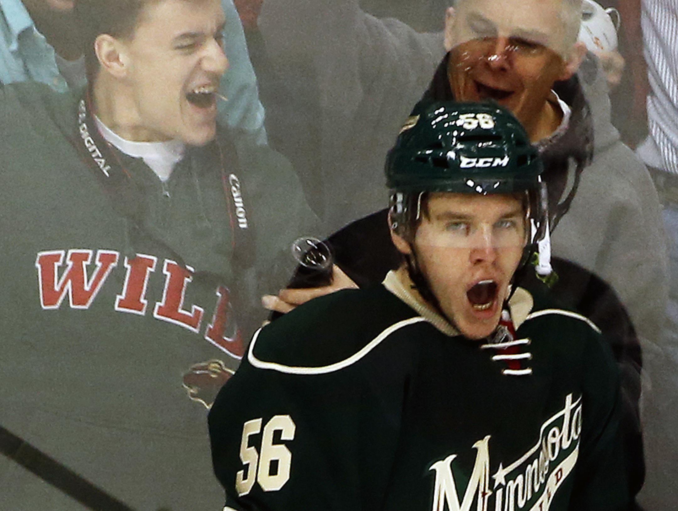 Wild fans celebrated with Wild's Erik Haula after he scored the first goal in the first period. ] Minnesota Wild vs. Pittsburgh Penguins. (MARLIN LEVISON/STARTRIBUNE(mlevison@startribune.com)
