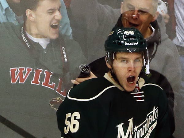 Wild fans celebrated with Wild's Erik Haula after he scored the first goal in the first period. ] Minnesota Wild vs. Pittsburgh Penguins. (MARLIN LEVI