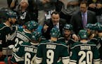 Wild coach John Torchetti talked with his players during the third period of Game 6 in the first round of the Stanley Cup playoffs against the Stars o