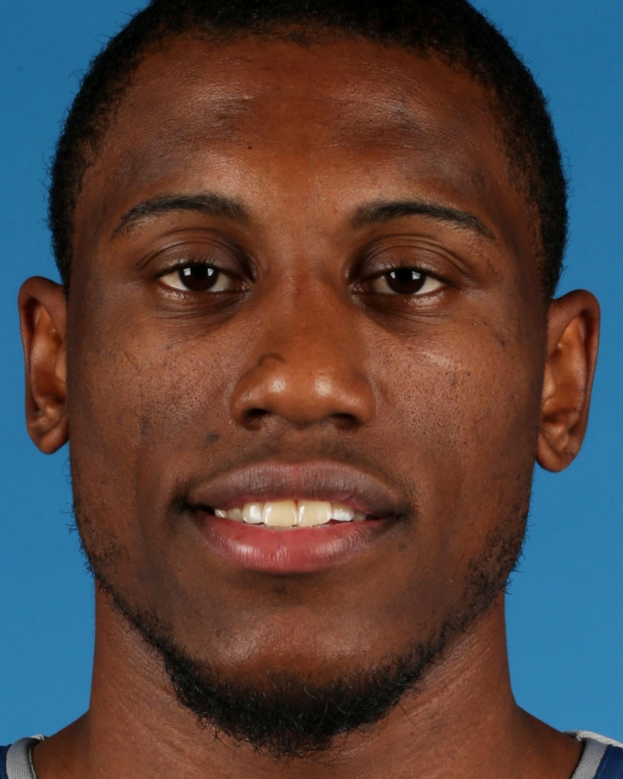 Minnesota Timberwolves' Thaddeus Young poses for media day photos Monday, Sept. 29, 2014, in Minneapolis. (AP Photo/Jim Mone) ORG XMIT: MP10