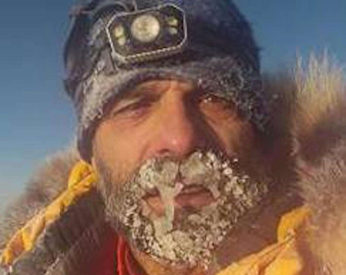 Lonnie Dupre is back in Minnesota after spending 29 days in solitude on Mt. McKinley, where he made history by becoming the first person to solo summit in January. In this photo he is standing on the summit. Photo provided by Lonnie Dupre.