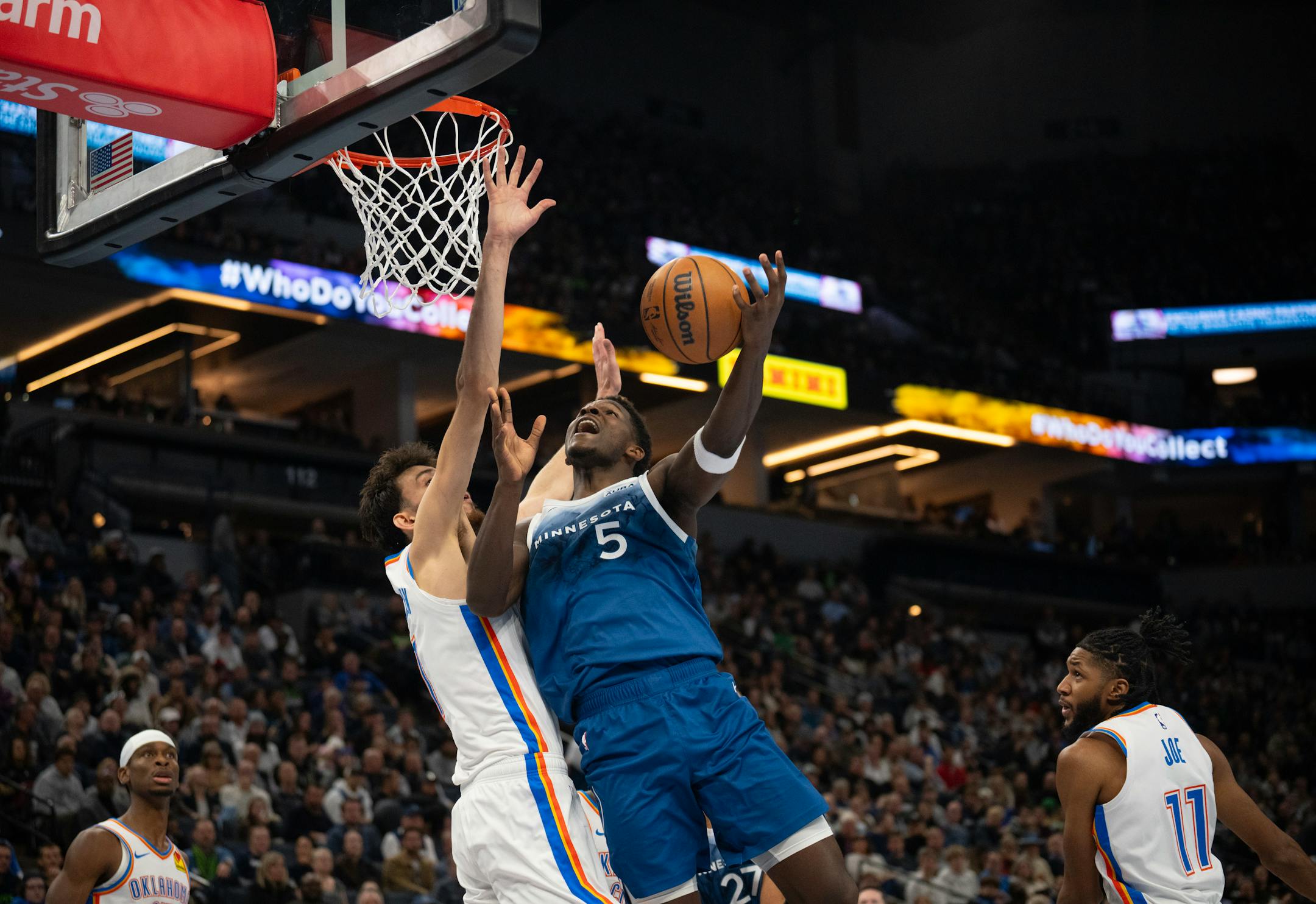 Oklahoma City Thunder forward Chet Holmgren (7) defended Minnesota Timberwolves guard Anthony Edwards (5) as he took a shot in the second quarter. The Minnesota Timberwolves faced the Oklahoma City Thunder in an NBA basketball game Tuesday night, November 28, 2023 at Target Center in Minneapolis. ] JEFF WHEELER • Jeff.Wheeler@startribune.com ORG XMIT: MIN2311282033070097