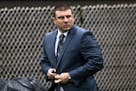FILE - In this May 13, 2019, file photo, New York City Police Officer Daniel Pantaleo leaves his house in the Staten Island borough of New York. An ad