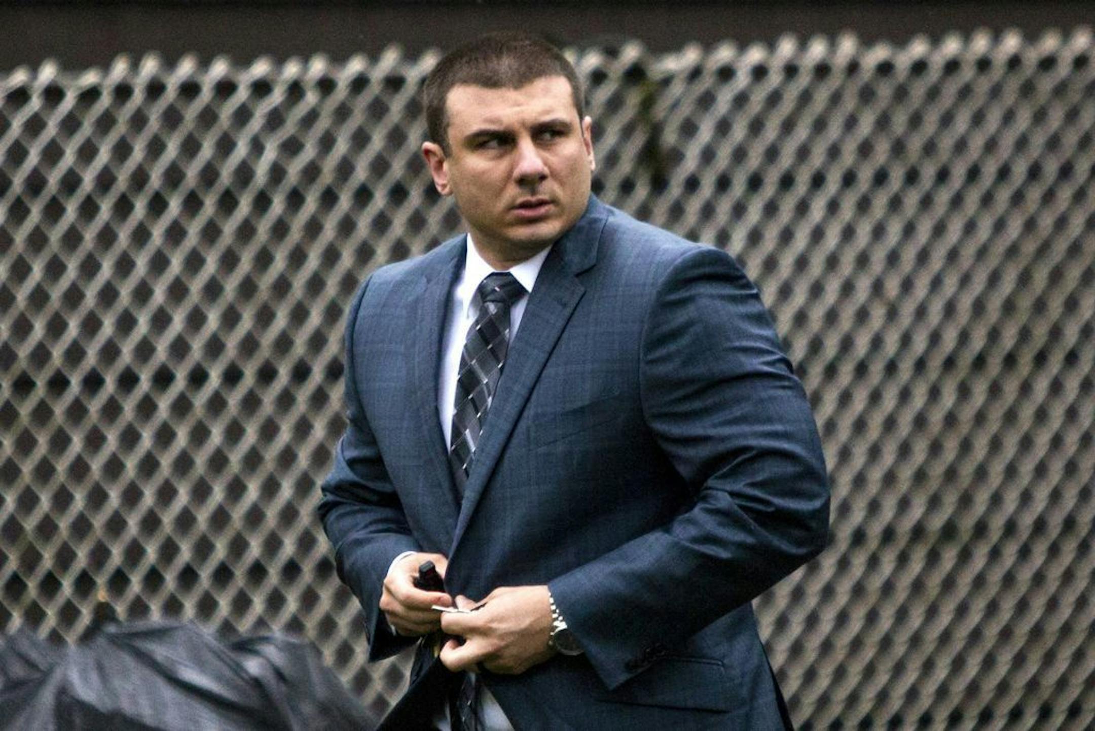 FILE - In this May 13, 2019, file photo, New York City Police Officer Daniel Pantaleo leaves his house in the Staten Island borough of New York. An administrative judge on Friday, Aug. 2,2019, has recommended firing Pantaleo, a New York City police officer accused of using a chokehold in the 2014 death of Eric Garner.
