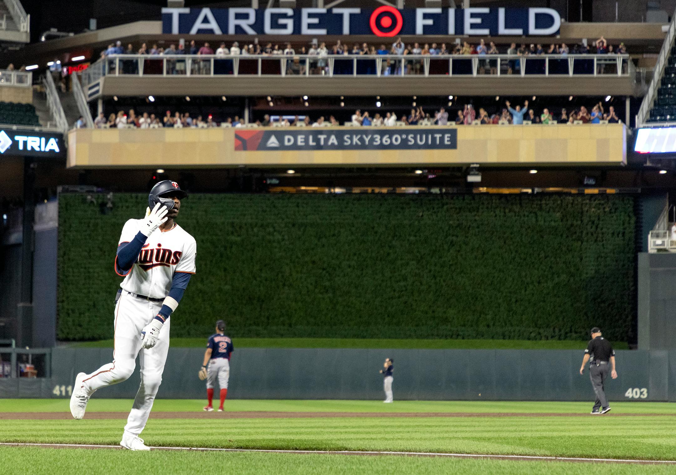Nick Gordon of the Minnesota Twins celebrates after hitting a grand slam home run in the fifth inning.